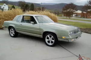 1986 OLDSMOBILE CUTLASS SUPREME . 1 OWNER. 29K MILES. V8 . GARAGE KEPT ..