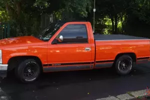 1988 CHEVROLET ORANGE/BLACK