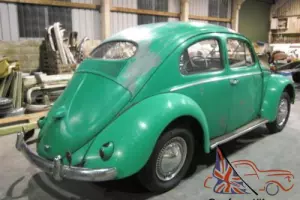 1955 VW Oval beetle. Early heart tail light grooved door model. Great project