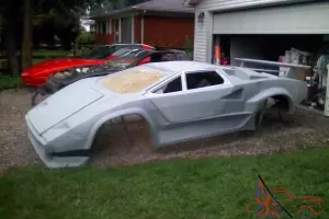 Lamborghini Countach kit car and Fiero donor. Brand new