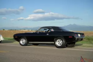 In '70, 618 440 Cuda coupes with auto trans produced
