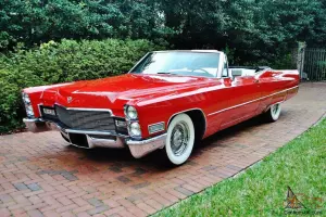 Wow what and amazing 1968 Cadillac Deville Convertible restored a/c red/white.