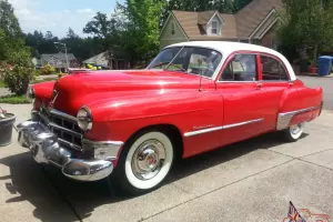 1949 Red and White Cadillac Series 62 4 Doors