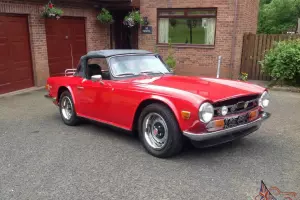 TRIUMPH TR6 RED soft top sports car Photo