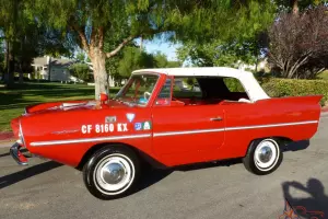 Amphicar Convertible Amphibian Boat drive on the street swim in the lake