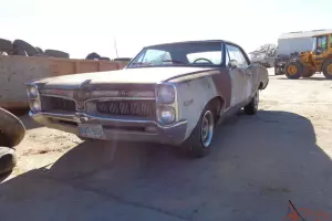 Factory over head cam 6 CYL, 3 SPD Floor shift car