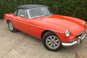  MG B Roadster...blaze orange..superb bodywork with leather interior. Overdrive. 