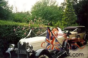  1928 Chevrolet and 1930 Buick - Fully restored.  Photo