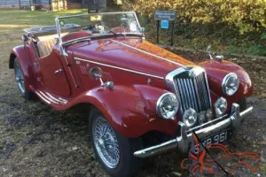 MG TF, 1954, 1250cc with 5 speed gearbox conversion , Red with tan interior.