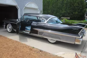 1958 Cadillac Fleetwood 60S Black with Aqua interior