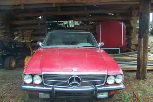 cherry red w/hard top & new black top,not wrecked,stored running in shed 5 years
