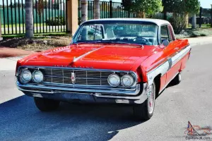 The best 62 Oldsmobile Starfire coupe with factory a/c ive ever seen driven.65ks