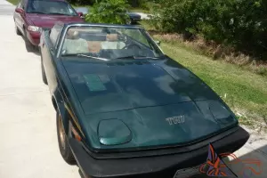 A 34 year old classic green with tan interior and 66,000 original miles