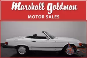 BEAUTIFUL1986 MERCEDES 560SL IN WHITE WITH NAVY 33,000 MILES