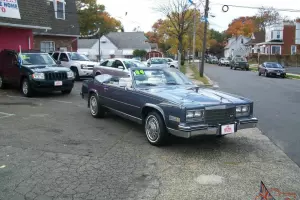Black Cadillac Coupe Deville