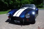 1965 Shelby Cobra with a 427 engine coupled to a 5 speed transmission