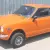 HONDA 600 COUPE Z600 Z ORANGE w/MAG WHEELS DRIVER VERY SHARP CLASSIC MINI CAR