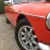  MG B Roadster...blaze orange..superb bodywork with leather interior. Overdrive. 