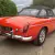  MG B Roadster...blaze orange..superb bodywork with leather interior. Overdrive. 