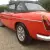  MG B Roadster...blaze orange..superb bodywork with leather interior. Overdrive. 