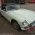MGB ROADSTER 1966 WHITE WITH RED HIDE SEATS PIPED IN WHITE