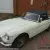 MGB ROADSTER 1966 WHITE WITH RED HIDE SEATS PIPED IN WHITE