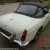 MGB ROADSTER 1966 WHITE WITH RED HIDE SEATS PIPED IN WHITE