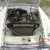 MGB ROADSTER 1966 WHITE WITH RED HIDE SEATS PIPED IN WHITE