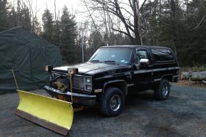 85 chevy blazer...k5 plow truck with 84 gmc parts truck Photo