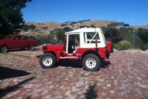 Beautiful Red Willys Jeep with "Best Top" with Rollcage