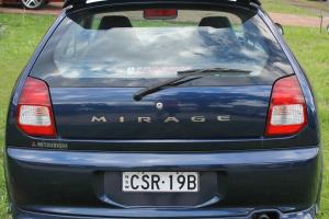 Mitsubishi Mirage 2003 3D Hatchback 5 SP Manual 1 5L Multi Point F INJ in Quakers Hill, NSW