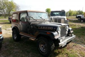1985 Jeep CJ7 Laredo Stainless 5spd A/c, Cruise, Unmolested ,  No Rust 120K mil Photo