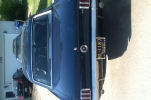 1965 Ford Mustang 4.7L This is a very high compression racing engine. Photo
