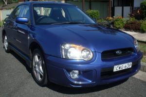 Subaru Impreza RS AWD 2003 4D Sedan 5 SP Manual 2 5L Multi Point in Wallsend, NSW