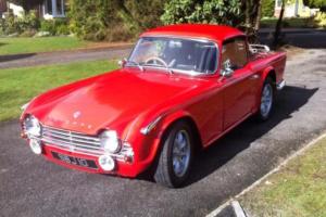 Triumph TR4a MODIFIED WITH SURREY ROOF Photo