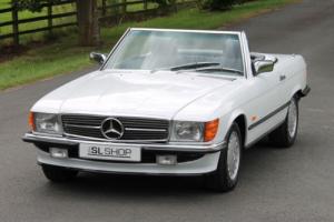 Mercedes-Benz R107 300 SL (1988) Arctic White with Blue MB Tex Photo