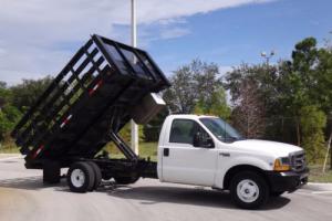 1999 Ford F-350 12ft Flatbed Stake Dump Truck Photo