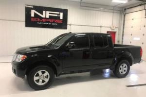 2013 Nissan Frontier SV 4x4 4dr Crew Cab 5 ft. SB Pickup 5A Photo