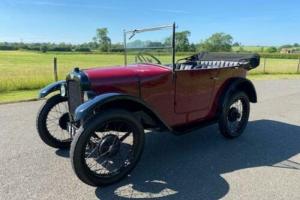 1929 Austin Seven Chummy in Maroon with black interior and black hood.