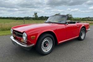 1975 Triumph TR6 125bhp CR Chassis. Signal Red, Black interior and soft top Photo