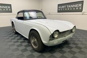 1963 Triumph TR4 1963 TRIUMPH TR-4. 4-SPEED WITH OVERDRIVE, WIRES, SURREY TOP Photo