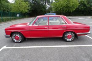 1973 Mercedes W114 280e Red Classic with zero VED and free from ULEZ charges