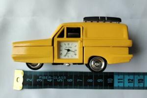 Yellow Reliant Robin model vehicle with working clock in the door for Sale