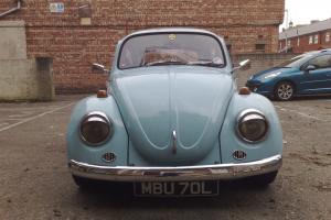  1973 tax exempt blue and white vw beetle  Photo