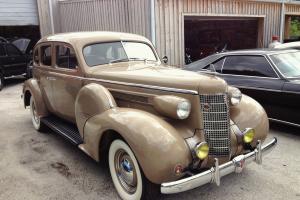 AACA Senior National Winner 1937 Oldsmobile Eight Cylinder with Dual Side Mounts Photo