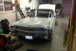 White 1964 Cadillac deville convertible