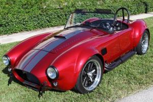 NEW 1965 BACKDRAFT ROADSTER FORD COYOTE T5 5 Speed CHRYSTAL RED  Gray Stripes Photo
