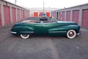 VINTAGE 1946 OLDS CUSTOM CRUISER CONV (OLDS CLUBE SAYS LAST TO EXIST FOR 1946 ). Photo