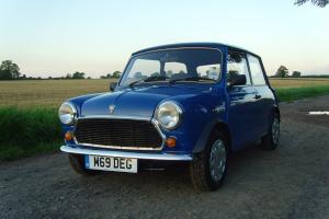  An entertaining Rover Mini Sprite with just 25,099 miles from new 