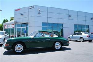 VERY CLEAN, RESTORED, SUNROOF, NEW TIRES, LEATHER, WOOD WHEEL, OVER 60K INVESTED Photo